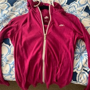 nike jacket,fuchsia color, size medium in woman